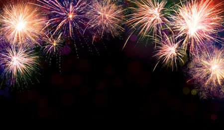 Beautiful bright firework lighting up night skyの写真素材