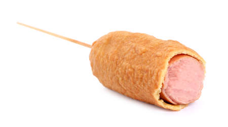 Delicious bitten deep fried corn dog isolated on whiteの写真素材