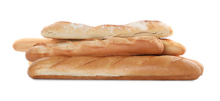 Different tasty baguettes on white background. Fresh bread