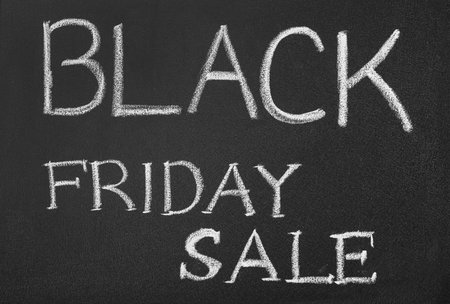 Words Black Friday Sale written on chalkboard, top viewの写真素材