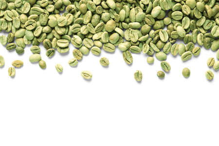 Many green coffee beans on white background, top viewの写真素材