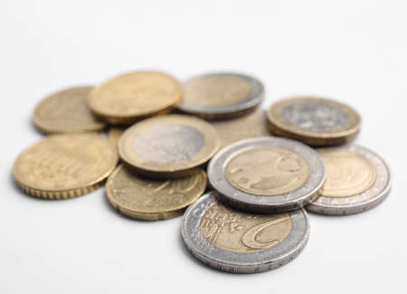 Pile of Euro coins on white background, closeupの写真素材