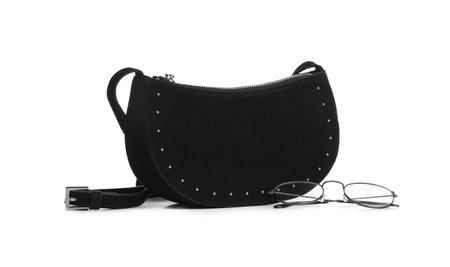 Stylish woman's bag and glasses isolated on whiteの写真素材