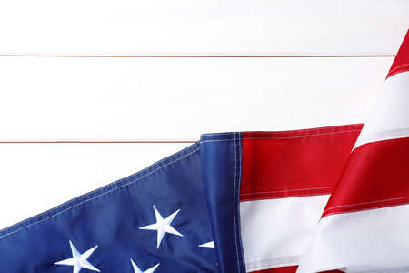 National flag of America and space for text on white wooden table, top viewの写真素材