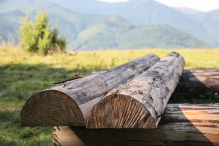 Stack of cut firewood outdoors, closeup. Heating in winterの写真素材