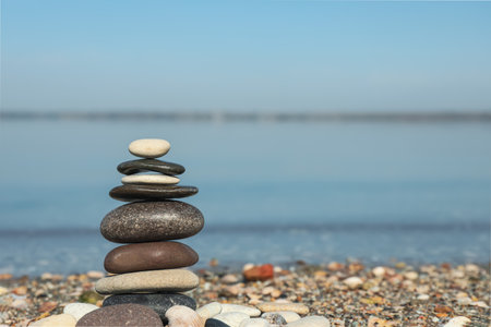 Stack of stones on beach, space for text. Harmony and balance conceptの写真素材