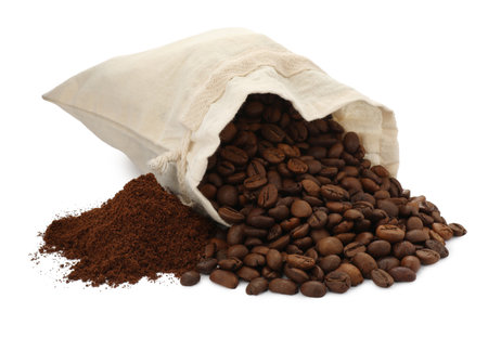 Coffee grounds and roasted beans on white backgroundの写真素材