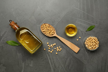 Flat lay composition with soybean oil on gray tableの写真素材