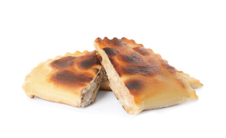 Cut fried cheburek isolated on white. Traditional pastryの写真素材