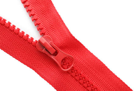 Red zipper on white background, top viewの写真素材