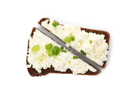 Bread with cottage cheese and green onion on white background, top viewの写真素材