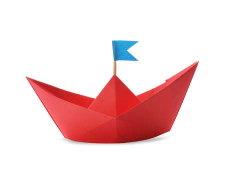 Handmade red paper boat with flag isolated on white. Origami artの写真素材