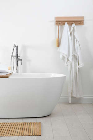 Stylish bathroom interior with modern white tubの写真素材