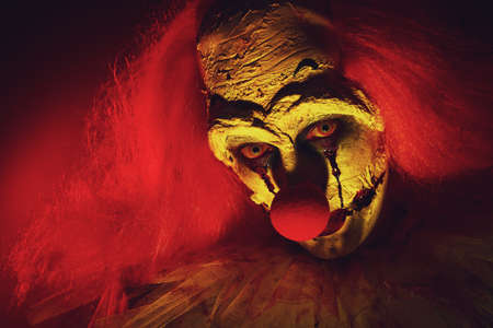 Portrait of terrifying clown, closeup. Halloween party costumeの写真素材