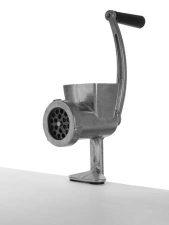 Metal manual meat grinder isolated on white