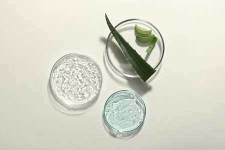 Flat lay composition with cosmetic gel and aloe on white backgroundの写真素材