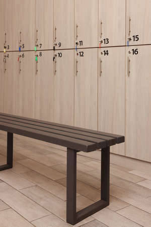 Wooden bench near lockers in changing roomの写真素材