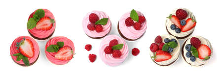 Set with delicious cupcakes on white background, top view. Banner designの写真素材