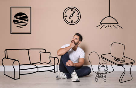 Young man dreaming about renovation on floor. Illustrated interior designの写真素材
