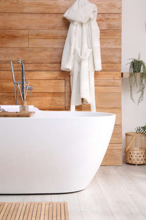 White tub and beautiful plants in bathroom, Interior designの写真素材