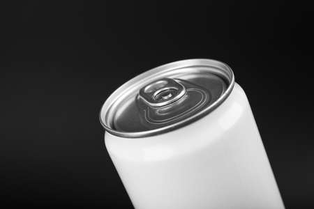 White can of energy drink on black background, closeup. Space for textの写真素材