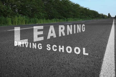 Driving school concept. View of modern asphalt road in countrysideの写真素材