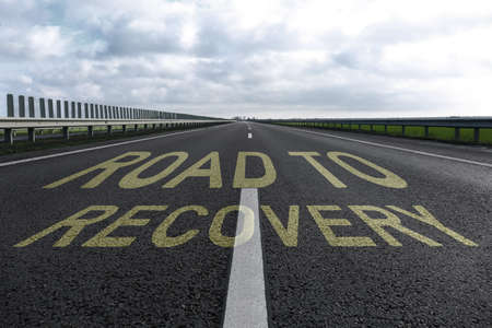 Start to live without alcohol addiction. Phrase ROAD TO RECOVERY on asphalt highwayの写真素材