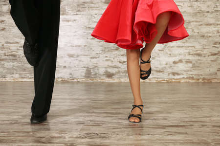 Couple of kids dancing together in studio, closeup