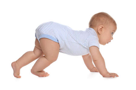 Cute little baby boy crawling on white backgroundの写真素材