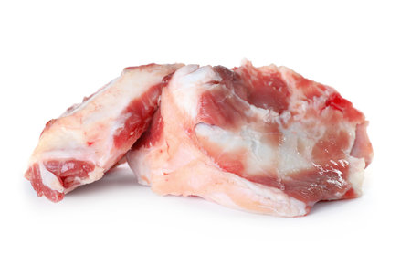 Raw chopped meaty bones on white backgroundの写真素材