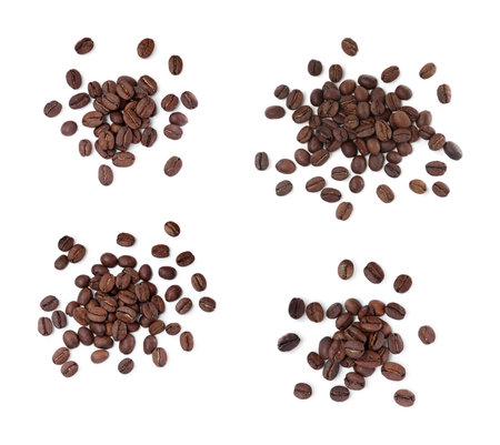 Set with roasted coffee beans on white background, top viewの写真素材