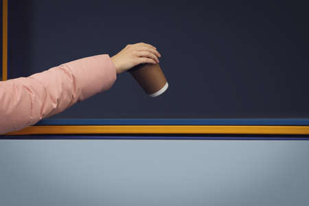 Woman throwing paper coffee cup into garbage bin outdoors, closeup. Waste sorting