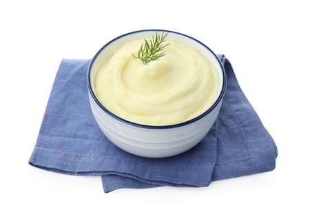 Bowl with freshly cooked homemade mashed potatoes and napkin isolated on whiteの写真素材
