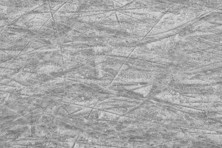Frozen ice skating surface as background. Winter season