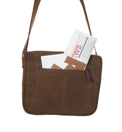 Brown postman bag with mails and newspaper on white backgroundの写真素材