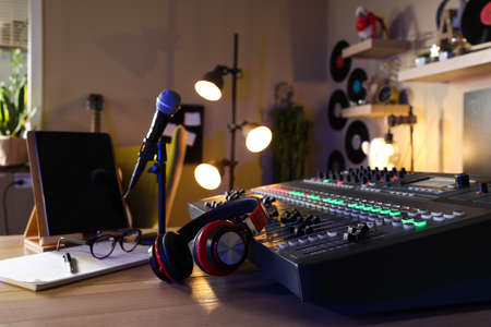 Professional audio equipment in modern radio studio