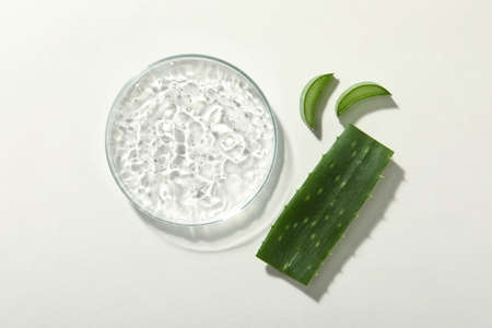 Cosmetic gel and aloe on white background, flat layの写真素材