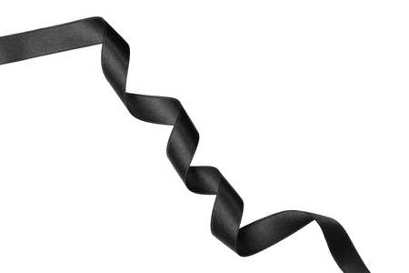 Black satin ribbon on white background, top viewの写真素材