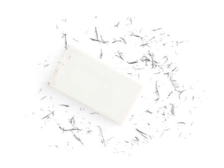 Eraser and gray crumbs on white background, top viewの写真素材