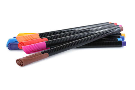 Many colorful markers on white background. School stationery