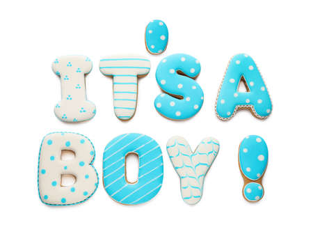 Phrase IT IS A BOY made of tasty cookies on white background, top view. baby shower partyの写真素材
