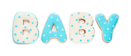 Word BABY made of tasty cookies on white background, top viewの写真素材