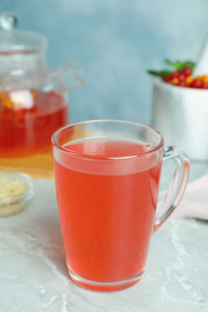 Immunity boosting drink on light gray marble table