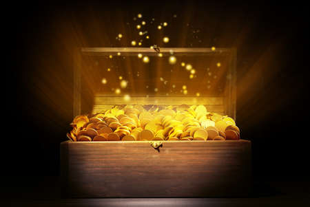 Open treasure chest with gold coins on table against black background
