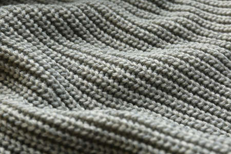 Beautiful gray knitted fabric as background, closeupの写真素材