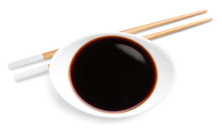 Bowl of soy sauce with chopsticks on white background, top viewの写真素材