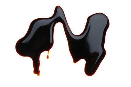 Spilled soy sauce on white background, top viewの写真素材
