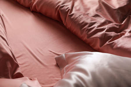 Close up view of bed with beautiful silk linesの写真素材