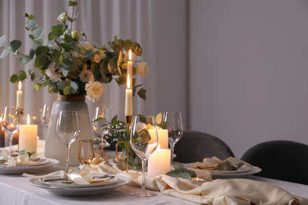 Festive table setting with beautiful decor indoorsの写真素材