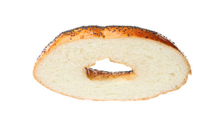 Half of delicious fresh bagel isolated on whiteの写真素材